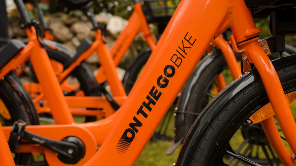 Close-up of an orange OnTheGo bike